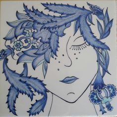 a drawing of a woman with blue leaves on her head