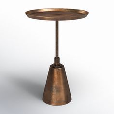 a small table with a metal base on it