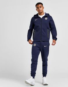 Show your team pride when you layer up in this men's Chelsea FC Tech Fleece Hoodie from Nike. In an Obsidian colourway, this hoodie is made with Nike's ultra-smooth, lightweight Tech fleece fabric for lightweight warmth. With a smooth feel inside and out, it features a full-length dual-zip closure and a hood to amp up the coverage, and long sleeves with a stretchy binding around the trims to secure the fit. With zipped pockets for easy storage, it's finished with signature Swoosh branding to the chest and the iconic Chelsea FC badge. Machine washable. Tech Fleece Hoodie, Nike Tech, Tech Fleece, Blue Nike, Chelsea Fc, Jd Sports, Easy Storage, Fleece Hoodie, Fleece Fabric