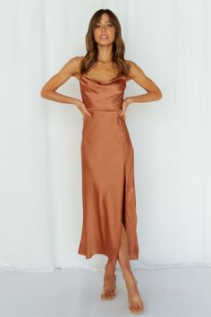 Length from shoulder to hem of size S: 103cm. Rust midi dress. Lined. Cold hand wash only. Model is a standard XS and is wearing XS. True to size. Lightweight, woven satin fabric. Invisible back zipper. Polyester. With this cute AF satin midi, you'll be hypnotizing everyone in the room. Get ready to hear about everyone's desires. The Stand On My Own Midi Dress has a lovely open back, with a straight neckline and boning at the torso. Style yours with strappy heels and gold adornments. Denpasar, Rust Bridesmaid Dress, Orange Bridesmaid, Midi Dress Formal, Buy Dresses Online, Rust Dress, Dress Satin, On My Own, Dress Formal