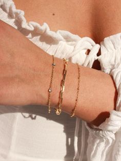 *Buy any 2 items, Get 15% OFF your order. Coupon applied at checkout.* * Single Paperclip Chain Bracelet * Gold Filled * Size Length options: 5", 5.5", 6", 6.5", 7" all sizes have the option of adding a 1" extender * Thickness: 3mm ►WHY GOLD FILLED? If you have been on the search for everyday gold jewelry that doesn't tarnish but affordable, gold filled is the best choice! Gold filled jewelry is second best after solid gold jewelry. *Our Gold filled jewelry has an outer layer of 14k or 18k gold that is pressure bonded to a base metal of jewelers brass or sterling silver. * Our gold filled jewelry can withstand normal body sweat, body oils, and is typically water resistant. ►JEWELRY CARE: Take extra care of your new jewelry to maximize its lifespan: *Try to avoid contact with chlorine, salt Oval Link Bracelet For Gift, Chain Link Charm Bracelet With Strap As Gift, Chain Link Charm Bracelet With Bracelet Strap As Gift, Chain Link Charm Bracelet As A Gift, Adjustable Oval Link Chain Bracelet For Gift, Adjustable Oval Link Chain Bracelet As Gift, Rectangular Bracelets With Adjustable Chain, Dainty Chain Link Bracelet For Gift, Rectangular Adjustable Chain Bracelet As Gift