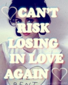 a woman with the words can't risk losing in love again