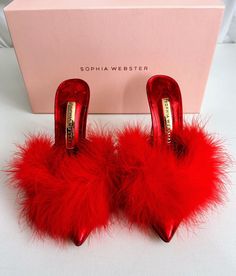 Skillfully crafted in Brazil, Sophia Webster's Delicia mules are styled with a dramatic marabou feather trim. This decorative leather pair is anchored by a leg-lengthening stiletto heel. Calf leather upper Point toe Slip-on style Lining: Leather Trim: Marabou feathers Leather sole Please review all photos to make sure this item is up to your purchasing standards. Please ask any questions before purchasing. This item is final sale. measurements are approximate not exact, please review photographed measurements before purchase Shop with confidence! All photos in this listing have been taken of the item you will be sent. Size 36 6 Saks Revolve party SSENSE YOOX mytheresa saks shopbop garmentory wedding vacation TikTok Revolve Party, Marabou Feathers, Feather Heels, Sophia Webster Shoes, Future Clothes, Feather Trim, 30th Birthday Parties, Girly Shoes, Sophia Webster