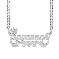 Turn your already beautiful name into a bold fashion statement with this personalized crowned name plate with scrollwork necklace in silver. Crafted in sterling silver This choice features your name - from three to 10 characters in length - sculpted in a stylish script font and topped with a crown. Beneath the name, sculpted scrolling ribbons and a center heart complete the look. Hammer-finished details add eye-catching shimmer and shine. This name art suspends centered along a curb chain that s Silver Name Plate Necklace, Luxury Sterling Silver Nameplate Necklace, Luxury Custom Name Necklace In Sterling Silver, Luxury Custom Sterling Silver Name Necklace, Customized Silver Nameplate Necklace, Elegant Customized Silver Name Necklace, Silver Nameplate Jewelry With Names, Elegant Silver Custom Necklace, Silver Nameplate Custom Necklace