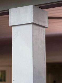 a close up of a white pillar in a building