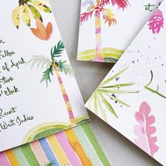 three cards with palm trees painted on them