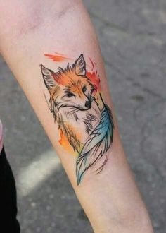 a small fox tattoo on the left forearm and right arm, with an arrow in it