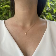 "14K Gold Moon Necklace, Tiny Crescent Moon, Minimalist Necklace, Dainty Moon Necklace This 14K Gold Moon Necklace is designed carefully to brighten your neck. It is suitable for everyday use as well as for your special days. Can be a perfect gift with its stylish and ambitious look. The crescent moon often represents growth, transition, and change. It's a symbol of potential and new beginnings. In many cultures, the moon is associated with feminine energy and is often linked to goddesses or dei Minimalist 14k Gold Half Moon Necklace, Feminine Intuition, Dainty Moon Necklace, Moon Minimalist, Tiny Gold Necklace, Simple Gold Necklace, Gold Star Pendant, Gold Minimalist Jewelry, Petite Necklace