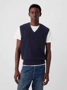 Soft, textured cotton sweater vest.  V-neck.  Sleeveless.  Banded hem.  * Fit: Classic.  A straight & easy fit.  Hits at the hip.  Models are 6′1″–6′2″ 185 cm–188 cm) with a 31″ 79 cm) waist & 32–33″ 81 cm–84 cm) inseam & are wearing Gap