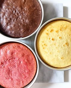 three different types of cakes in white bowls