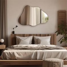 a bedroom with a bed, mirror and stool