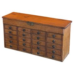 an old wooden chest with many drawers