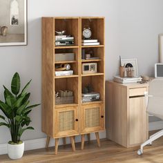 a wooden book case sitting next to a desk