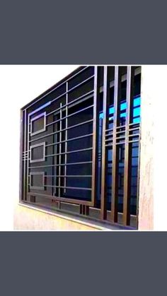 an image of a window with bars on the outside and blue light coming from behind it