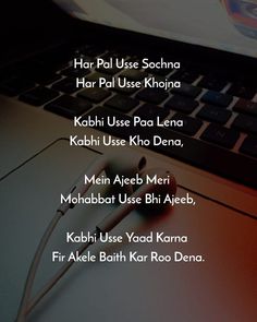 the words are written in different languages on a laptop screen with headphones attached to it