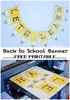 the back to school banner is being printed on a printer