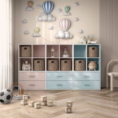 a child's room with toys, bookshelves and balloons on the wall