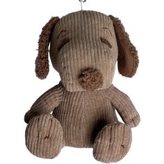 a brown stuffed dog hanging from a hook