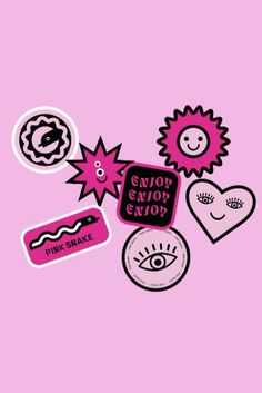 some stickers that are on a pink background and one has an eyeball, star,