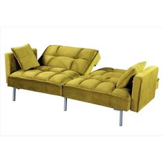 a yellow couch sitting on top of a metal frame