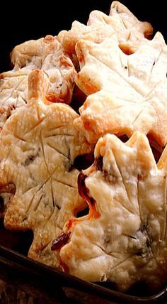 several pieces of pie in a pan on a table