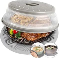 an image of a food steamer with noodles and broccoli in it