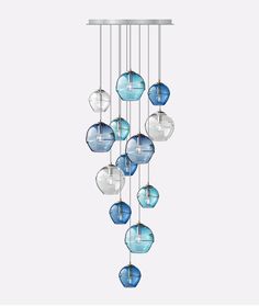 a mobile with blue and white glass balls hanging from it