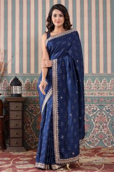 Buy beautiful navy blue georgette saree online in USA with embroidered border. Make a fashion statement at weddings with stunning designer sarees, embroidered sarees with blouse, wedding sarees, handloom sarees from Pure Elegance Indian fashion store in USA.-full view Blue Georgette Saree, Indian Designer Sarees, Indian Sarees Online, Indian Designer