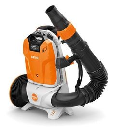 an orange and white vacuum is shown with its hose attached to the top of it