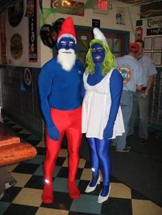 two people in costumes standing next to each other