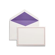 two envelopes with purple and white designs on them, one is open to reveal the inside