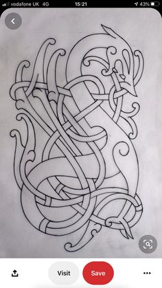 a drawing of an intricate design in black ink on white paper with the word love written across it