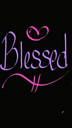 a black background with pink lettering and a heart