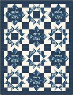 a blue and white quilt with an arrow pattern