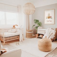 a baby's room with a crib, bed and dresser