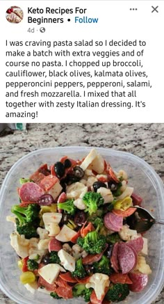 a salad in a plastic container with broccoli and olives