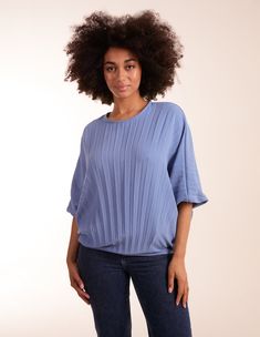 An essential addition to your wardrobe, this blouse is free from fuss for a timeless appeal. 95% Viscose, 5% Elastane Made in Italy Machine washable Round neckline 3/4 elasticated sleeve Elasticated waist Unfastened This item is a ONE size that fits UK 8-16 Model height: 175cm/ 5'9' Batwing Top, Oversized Top, Lightweight Tops, Effortless Chic, Bat Wings, Model Height, Warm Weather, Round Neckline, Vanilla