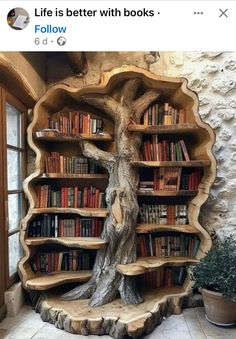 a book shelf made out of tree trunks and bookshelves in the shape of a tree