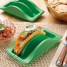 two taco plates are sitting on a table