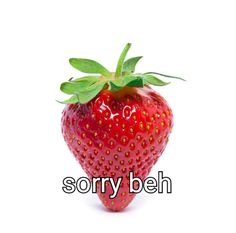 a close up of a strawberry with the words sorry beh on it's side