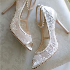 I Wore These Gorgeous Heels On My Wedding Day For About 6 Hours. The First Photo Was Taken By The Wedding Photographer. They Are Comfortable, Yet Have A “Something Borrowed” Feel To Them. They Have A Classic Look And Would Be Gorgeous For Any Occasion, Especially A Wedding! They Will Come In The Original Box :) Fitted Almond Toe Wedding Shoes, Champagne Open Toe Wedding Shoes, Elegant Wedding Shoes With 4-inch Heel For Bridal Shower, Elegant Lace Open Toe Wedding Shoes, Fitted Champagne Heels For Wedding, Elegant Cream Heels For Bride, Elegant Open Toe Wedding Shoes For Bride, Elegant Open Toe Heels For Bride, Elegant White Bridal Accessories For Wedding Reception