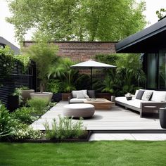 an outdoor living area with couches and tables