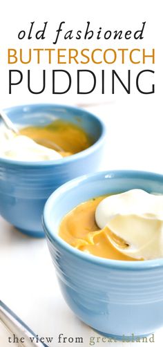 two blue bowls filled with butterscotch pudding on top of a white tablecloth