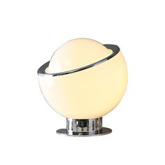 a white sphere light sitting on top of a metal stand