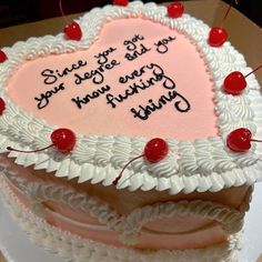 a heart - shaped cake with writing on it that says, since you've got your tongue and go