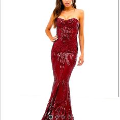 Great Quality Form Fitting, Sequin Floor Length Gown . Perfect For A Wedding Or Formal Event. Burgundy Prom Season Dress, Elegant Red Carpet Festive Dresses, Elegant Strapless Maxi Dress For Red Carpet, Fitted Burgundy Gown For Party, Elegant Red Carpet Dress With Sweetheart Neckline, Festive Full Length Prom Dresses, Fitted Burgundy Dress With Sweetheart Neckline, Festive Full-length Prom Dresses, Fitted Burgundy Dress For Prom Season