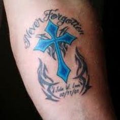 a man's arm with a blue cross tattoo on it and the words never forget