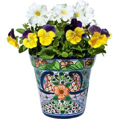 a colorful flower pot filled with white and yellow flowers