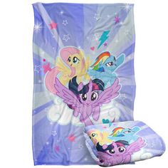 a blanket and pillow set with pinkie ponies on it