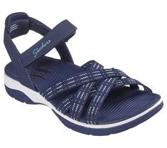 Long-lasting comfort combines with effortless style in Skechers Arch Fit Reggae Sport - Gotta Go. This sandal features a synthetic and soft Stretch Fit fabric upper with an adjustable strap, plus a cushioned Arch Fit footbed. | Skechers Women's Arch Fit Reggae Sport - Gotta Go Sandals | Medium Width | Patented Skechers Arch Fit contoured footbed with podiatrist-certified arch support | Podiatrist-designed shape developed with 20 years of data and 120, 000 unweighted foot scans | Contoured footbe Skechers Sandals, Tenis Nike, Wide Shoes, Skechers Women, Navy Fashion, African Attire, Personal Marketing, Shopping Hacks, Arch Support